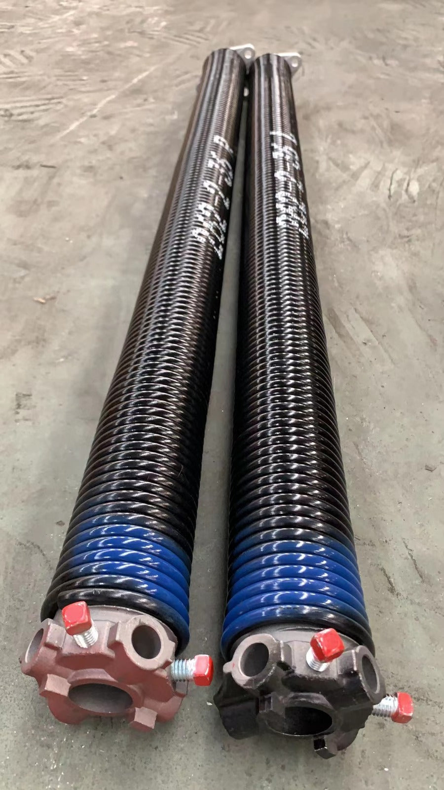 Torsion springs for garage door